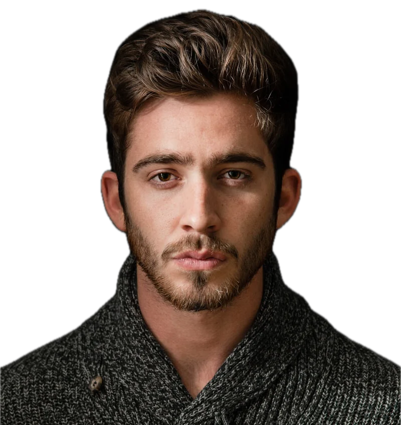 A bearded man in a chunky dark knit sweater