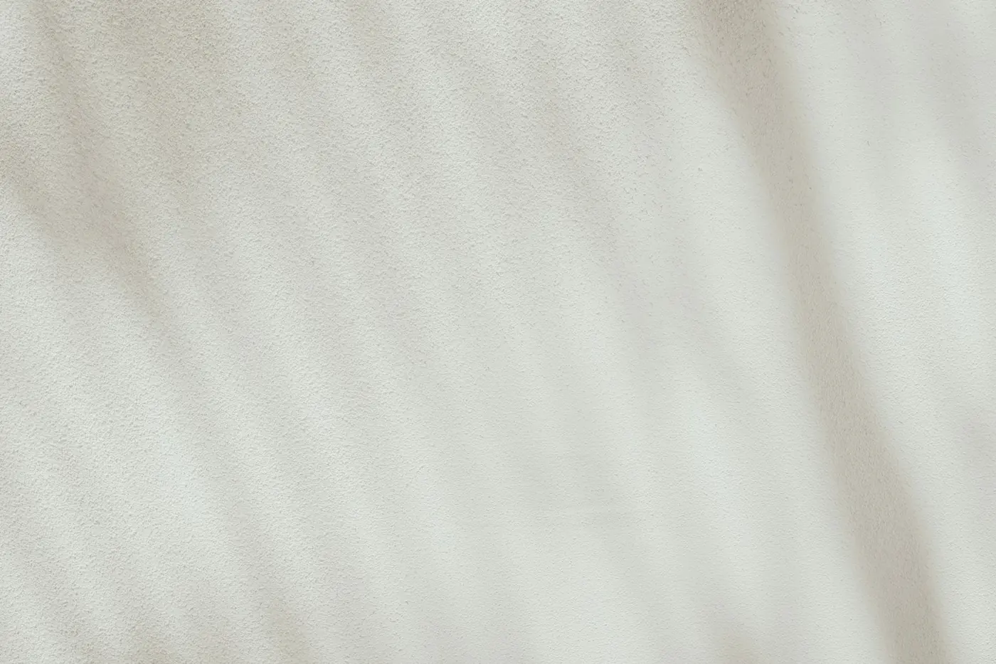 Soft shadows on cream fabric
